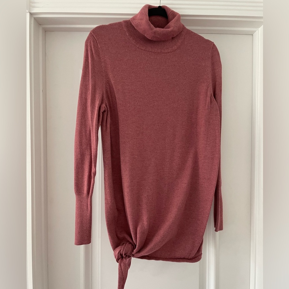 Cozy pink maternity turtleneck sweater